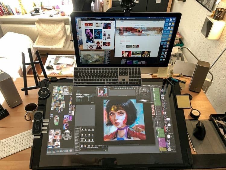 A digital art tablet displaying character illustration software